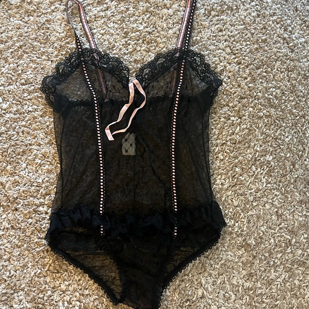 Soft goth mesh polka dot stretchy bodysuit with lace ruffles and pink trim